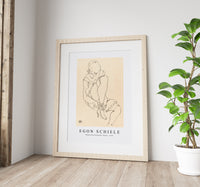 Egon Schiele - Woman Buttoning Her Shoes 1915