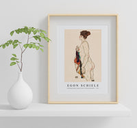 Egon Schiele - Standing Nude woman with a Patterned Robe 1917