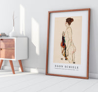 Egon Schiele - Standing Nude woman with a Patterned Robe 1917