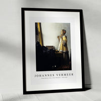 Johannes Vermeer - Young Woman with a Pearl Necklace 1663-1665