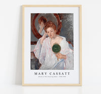 
              Mary Cassatt - Denise at Her Dressing Table 1908-1909
            